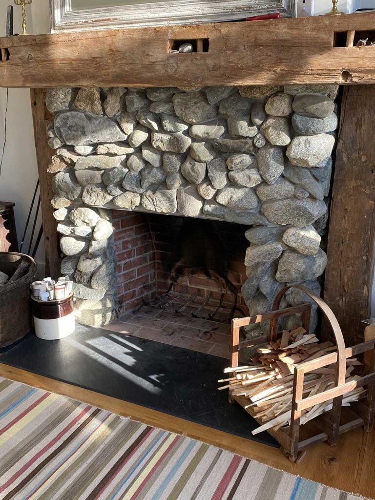 Stone and wood fireplace